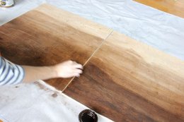with the thinned stain, start slowly working the stain within the lumber because of this Do-it-yourself wall art project