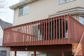 A bare back deck before its full makeover