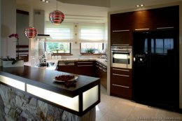 Modern Angular Kitchen with Exotic Wood and Extraordinary Pendant Lights