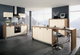 Modern Kitchen Design with Cool Gray Floors and heated Toned Cabinets