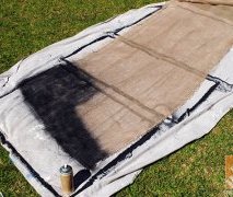 Spray some gardeners burlap with black colored squirt paint